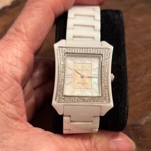 Vintage Invicta White Ceramic 2 Rows of Diamonds surrounding watch